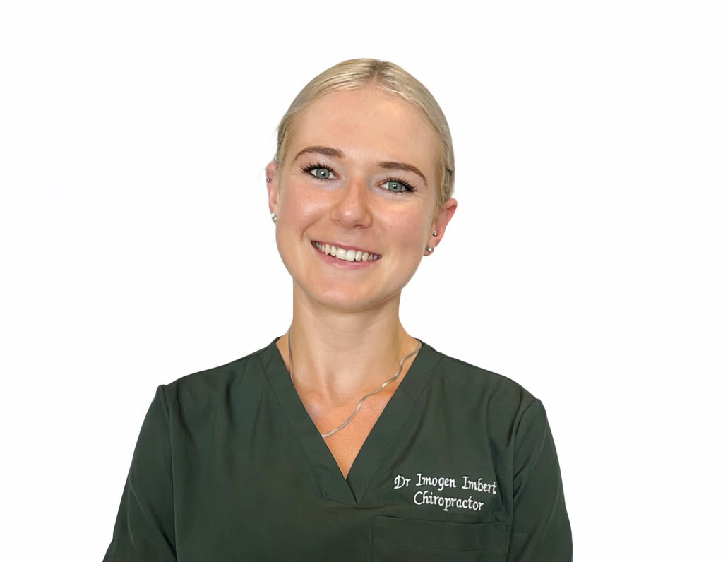 Home Smiling chiropractor in professional attire